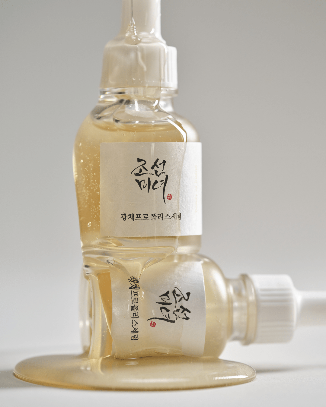 Beauty of Joseon Glow Serum bottles with golden serum